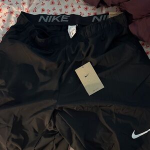 Nike Black men’s shorts with White Swoosh